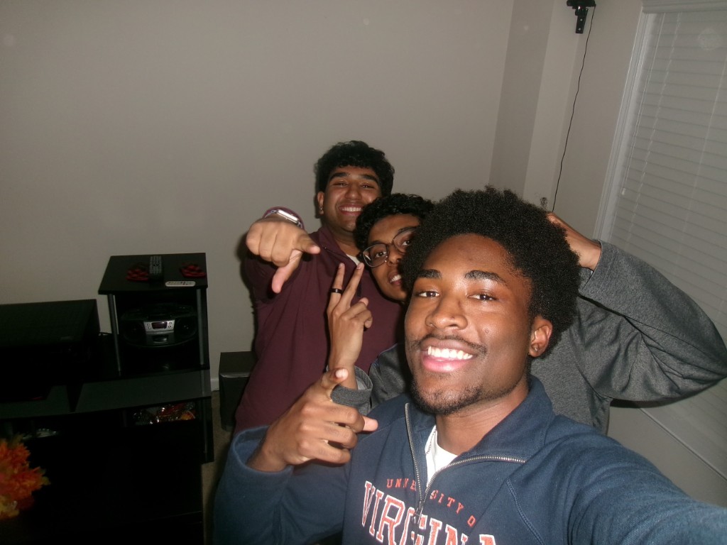 Group selfie with friends indoors